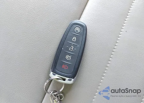 2014 Ford Escape Titanium z USA, uszkodzony, nr VIN 1FMCU0J94EUD77831